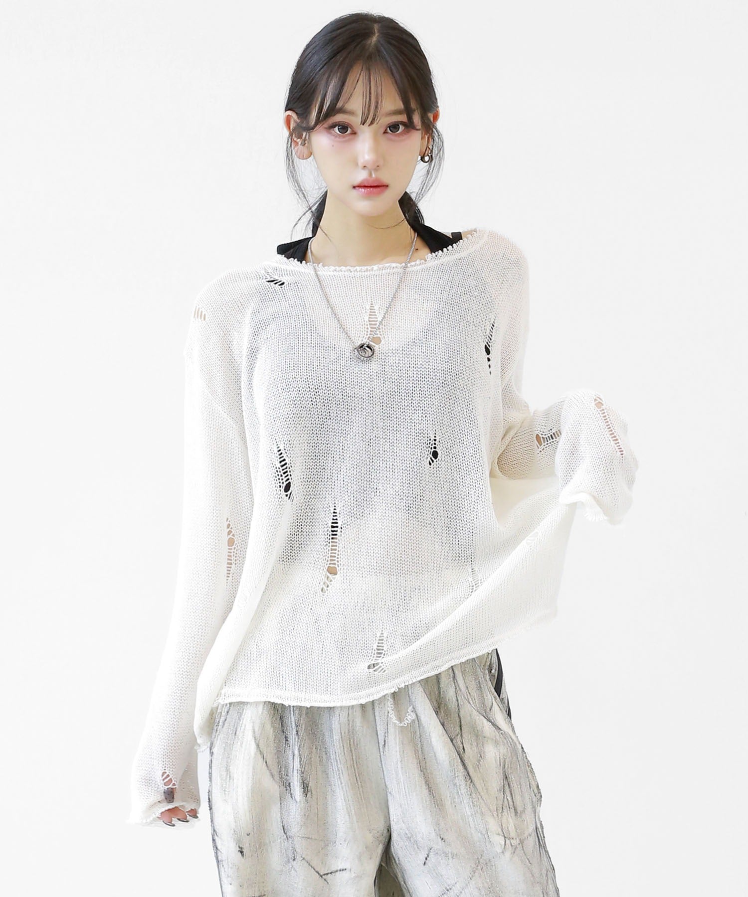 Distressed long sleeve knit
