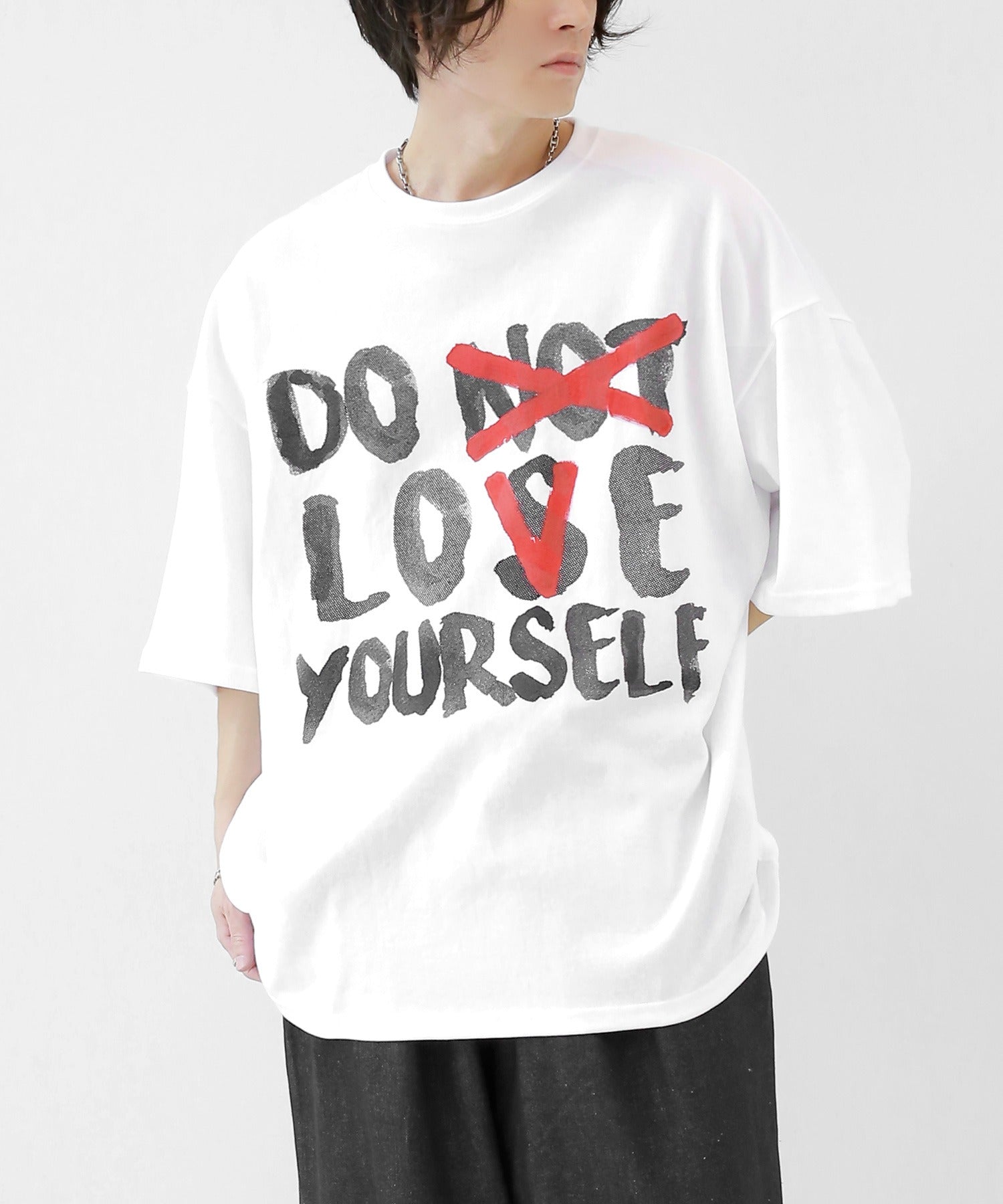 Painted logo over T