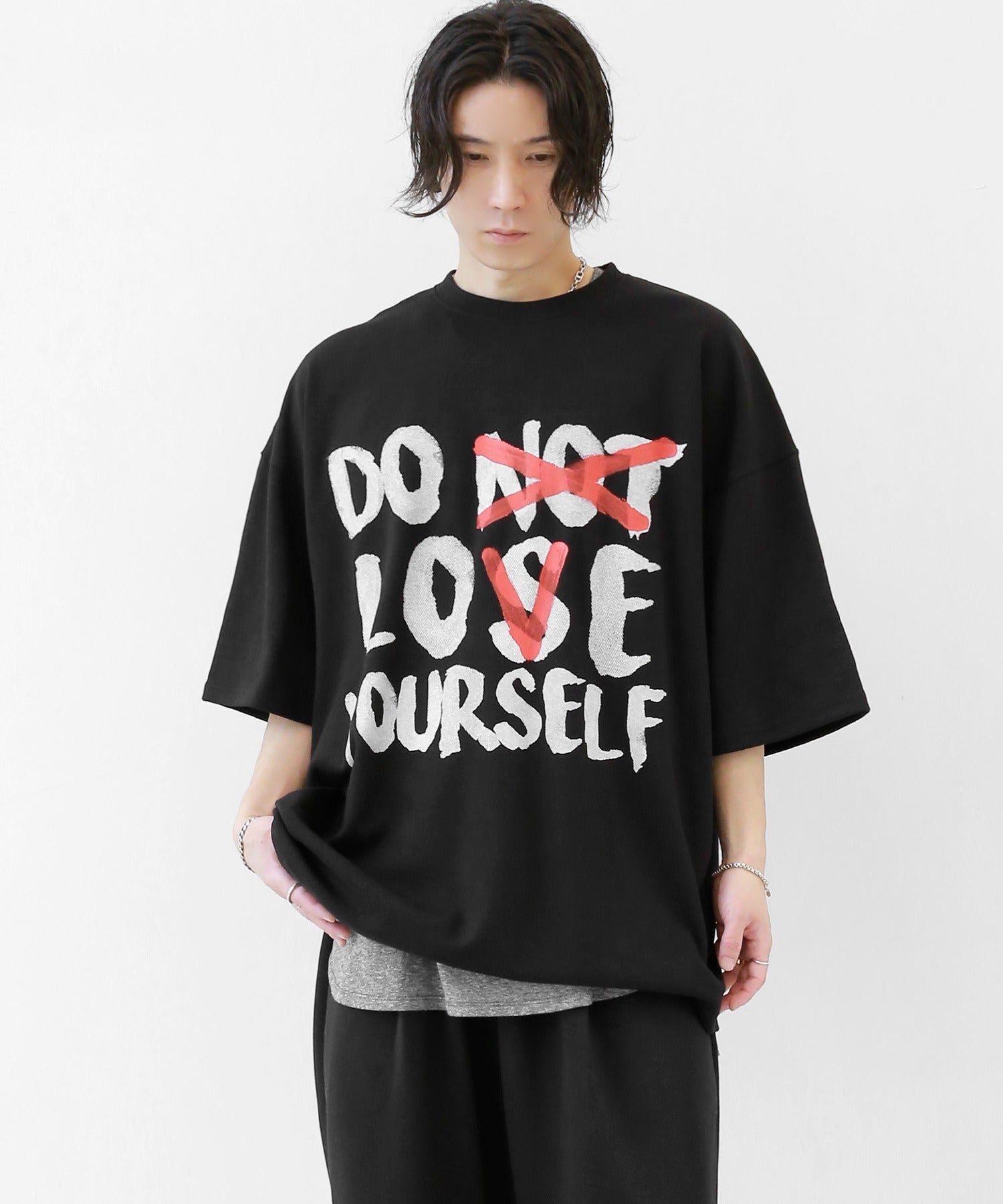 Painted logo over T